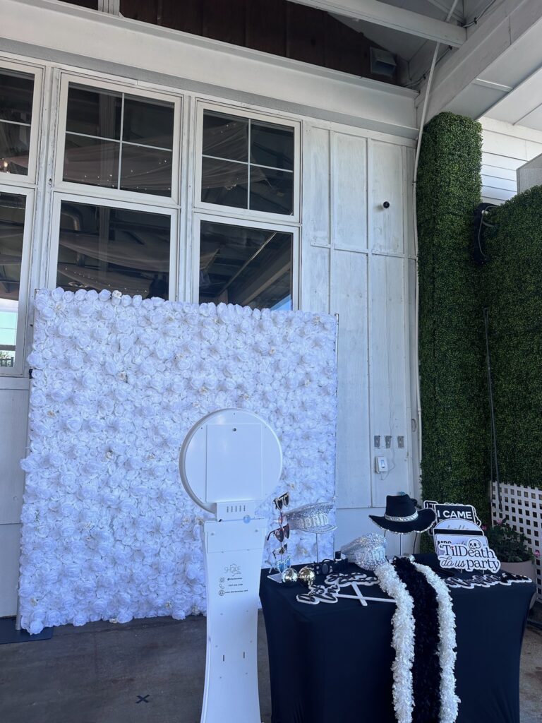 White Flower Wall Setup with Photo Booth